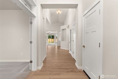 Welcome home! Step into the entry hall with hardwood flooring, contemporary details and white millwork throughout.