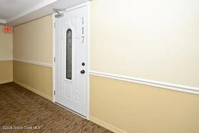 Twin Towers unit 117-S, Cocoa Beach, FL 32931 - photo 2