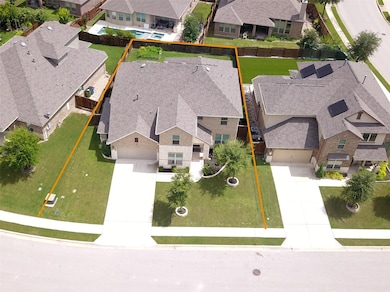 Aerial perspective of suburban area with property