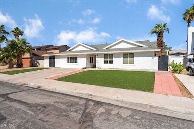 View of front facade featuring stucco siding and a