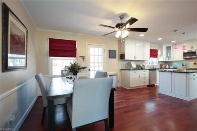 Ample dining space and french door to deck is perfect for entertaining.