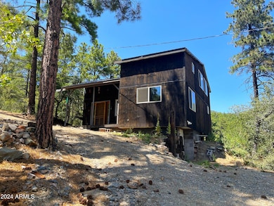 Cabin nestled high on a hill