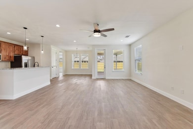 Unfurnished living room featuring recessed lighti