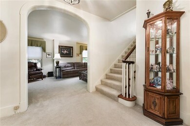 A large inviting entry way with unique archways on
