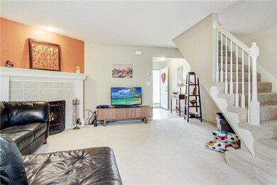 Wood burning fireplace (simulated for photo), room