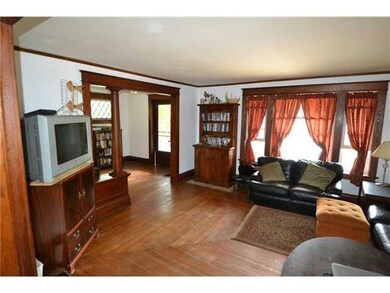 Living Room. Living room with natural wood pillar and trim.