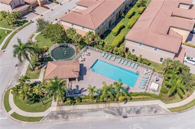 Aerial perspective of suburban area with a pool area
