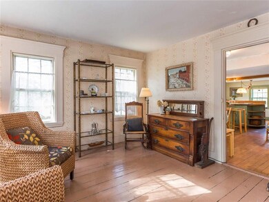 The spacious living room features...