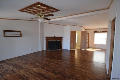 Living Room with Corner Fireplace