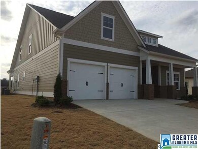 Two car garage with a parking pad. This home is on