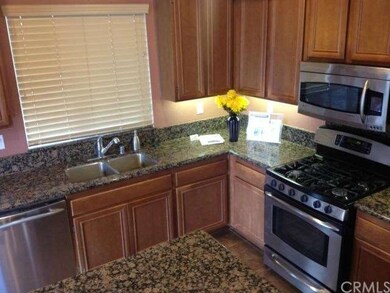 Kitchen with Granite counter top and stainless ste