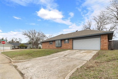 Ranch-style home featuring concrete driveway, a fr