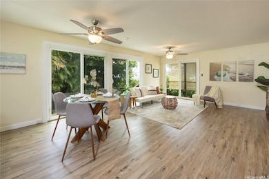 Spacious living area with newly installed luxury plank flooring throughout home.