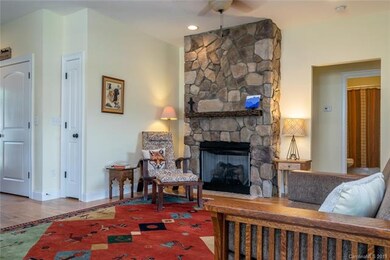Floor to ceiling stone fireplace in the great room
