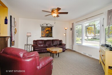 Light, bright and spacious family room opens to ki
