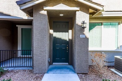 Property entrance featuring cooling unit and stucc