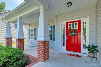 Property entrance featuring a porch