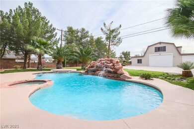 Pool/spa combo with waterfall