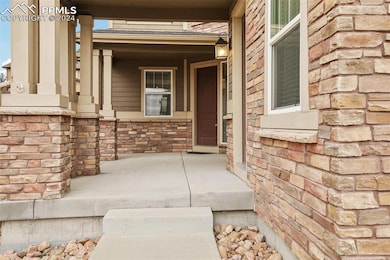 Entrance to property with covered porch