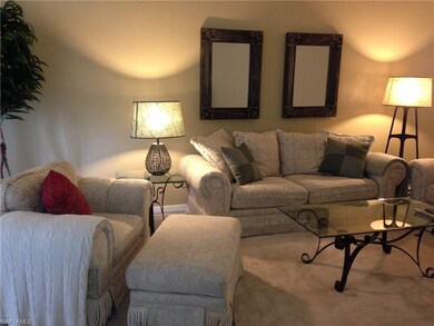 The living room features a neutral color palette a
