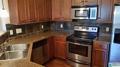 Awesome kitchen with granite, slate backsplash and