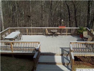 32 x 16 entertainment area overlooking woods, in a