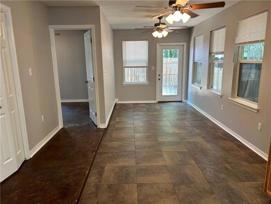 Long view of back dinning or bonus room.