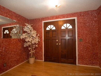 Welcome Home! Double front doors into entry hall.