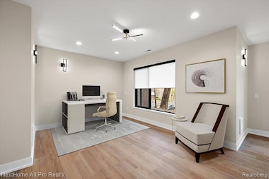 First Floor Office with recessed lighting and light wood-style flooring