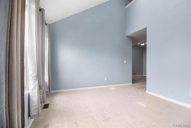 Living room with vaulted ceiling