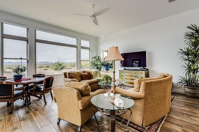 Living room w/wall of windows