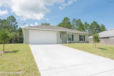 390 J T Sancho St SW, Palm Bay, FL 32908 - photo 2