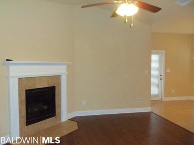 Hardwood floors in the great room and hall.