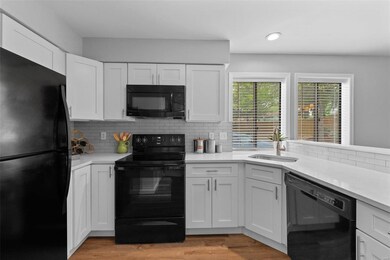 Nicely updated w/ Quartz counters & Subway Tile Ba