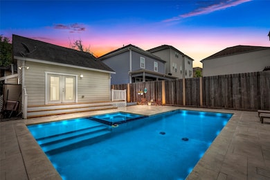 This photo showcases the charming backyard with a