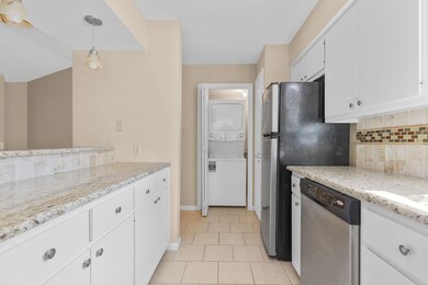 Kitchen with stainless steel appliances, stacked 