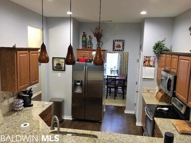 Spacious kitchen with stainless steel appliances. 