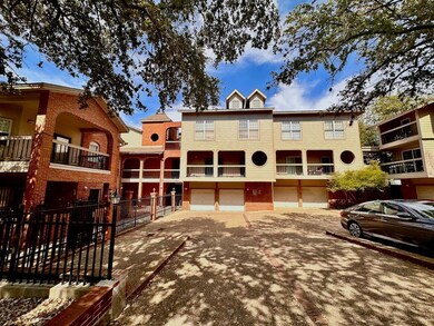View of front of house with an attached garage, c