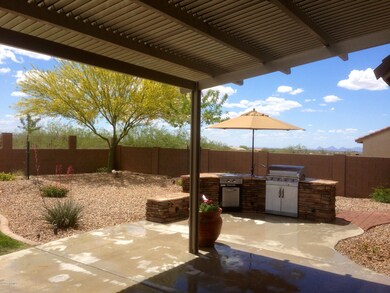 Outdoor kitchen and extended patio