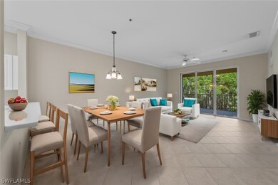 Tiled dining room with crown molding and ceiling f
