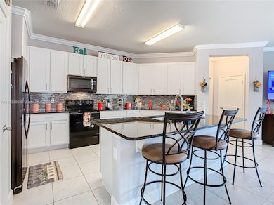 9158 Elsa Ct, Davenport, FL 33897 - photo 4