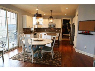 Kitchen. Enjoy views off the deck while dining.
