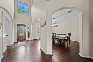 View to the front door from the living room. Lots