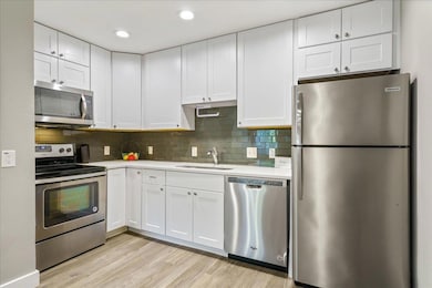 Updated kitchen with stainless steel appliances