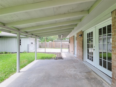 spacious back patio with cover to enjoy the oversi