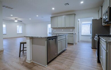 Kitchen featuring appliances with stainless steel 