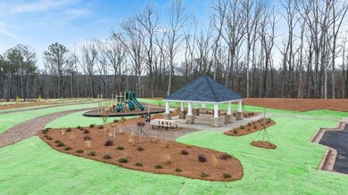 Surrounding community with a playground and a gazebo