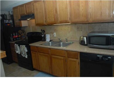 Unique floorplan has kitchen and family room on se
