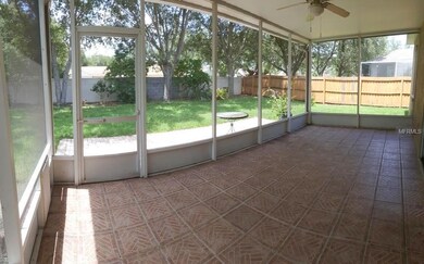 LANAI WITH FENCED IN BACK YARD