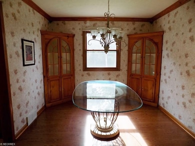 Dining room, laminate floors, china cabinets stay
